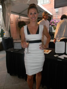 Brittany Pollock, buyer for O2 looking very Italian glam in Nicole Miller and upswept bun.