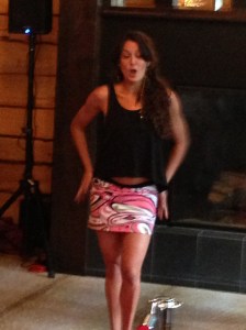 Heidi Hat pink faux Pucci mini-skirt with shorts hiding underneath.