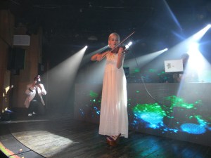 The Dolls, with DJ Mia Moretti and violinist Margot, performing at after-party at Belly Up.