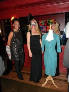 Brooke displaying the teal suede Jitrois dress that was auctioned to benefit St. Jude's Hospital in Memphis, Tennessee